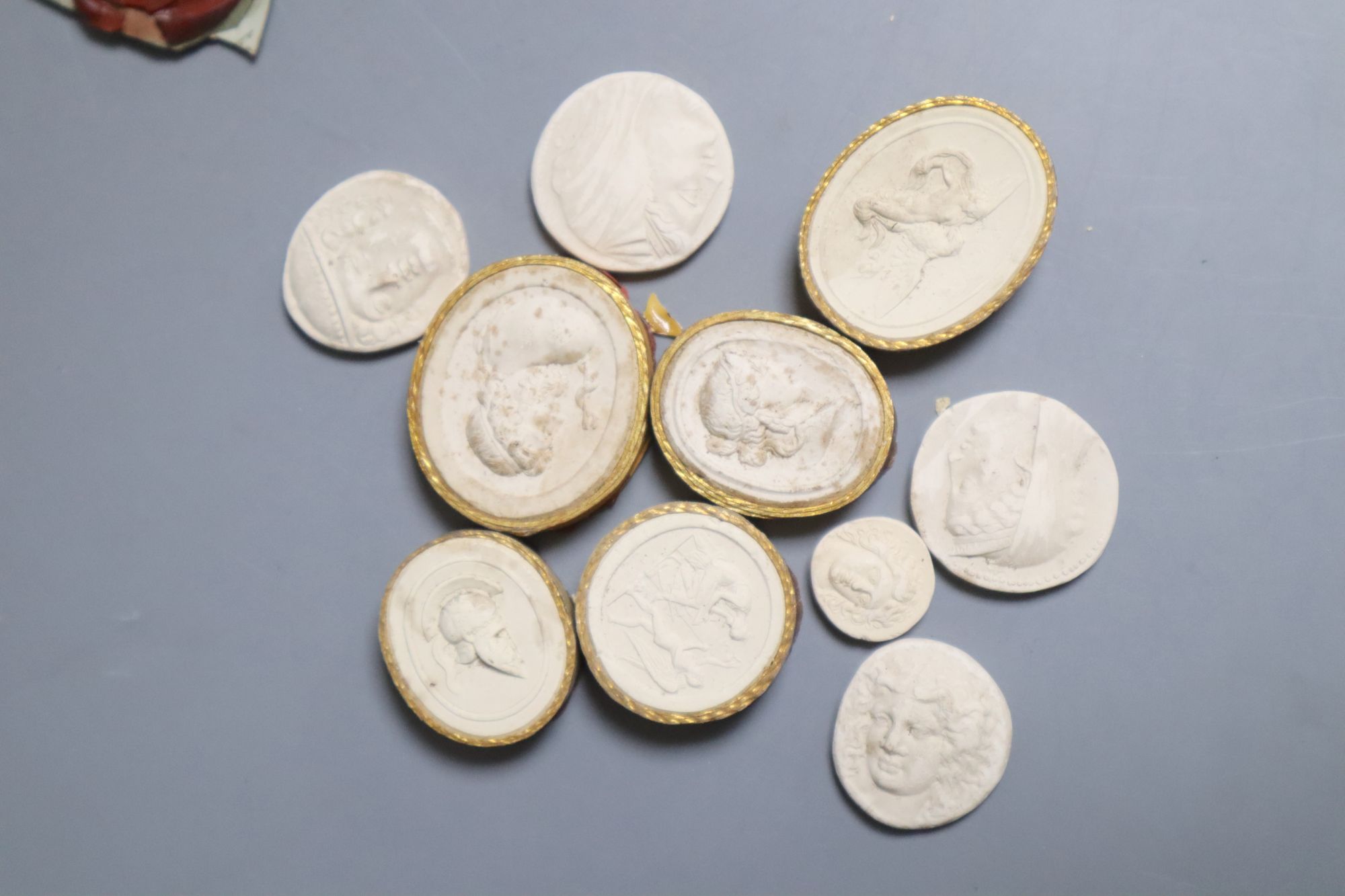 A group of 19th century plaster gems and wax seals